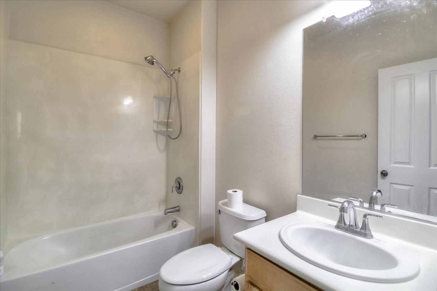 5306 Fioli Loop San Ramon, CA 94582 - Photo 9 of 14 a bathroom with a sink toilet and shower
