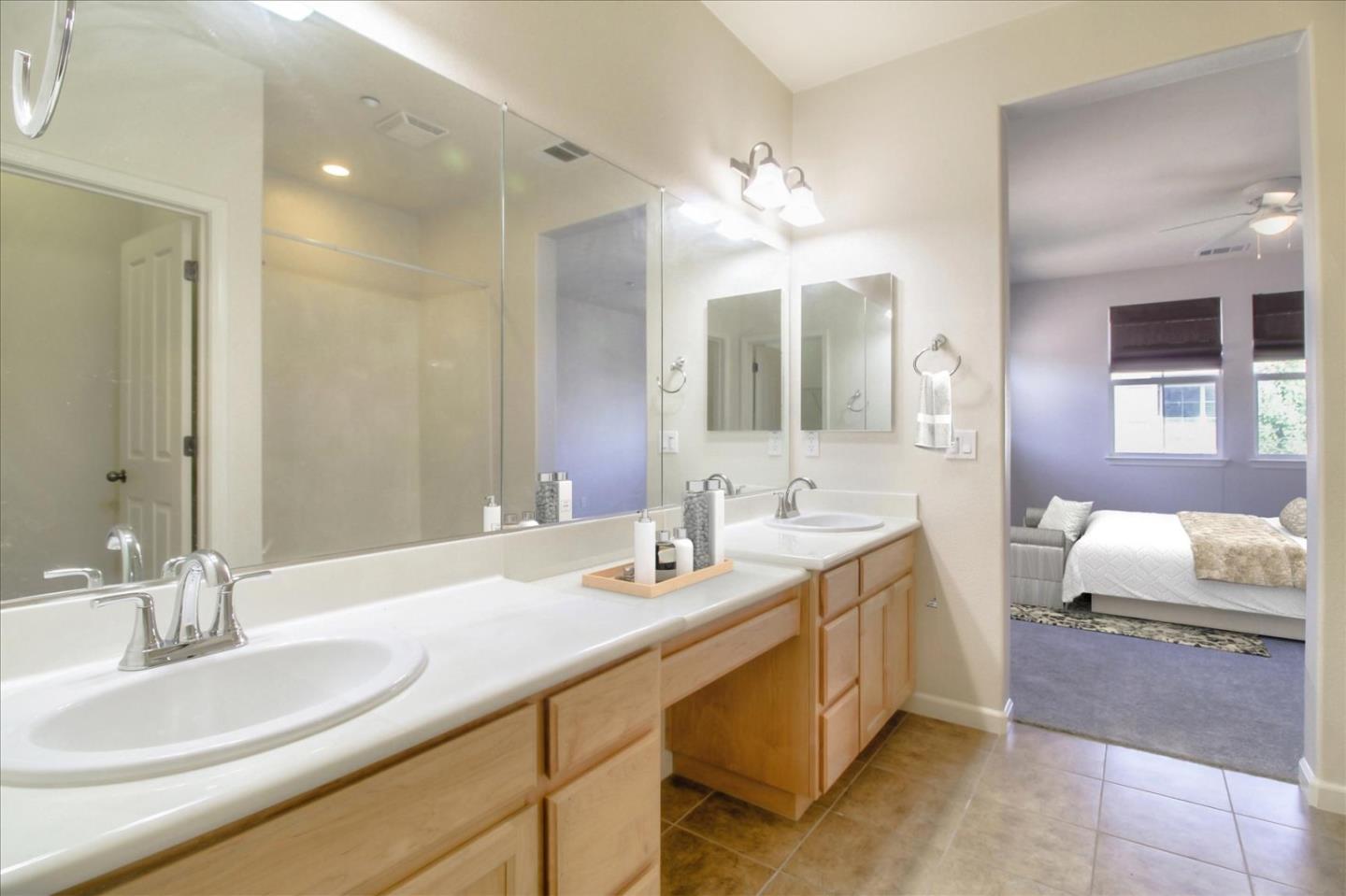 5306 Fioli Loop San Ramon, CA 94582 - Photo 10 of 14 a bathroom with a sink and a mirror