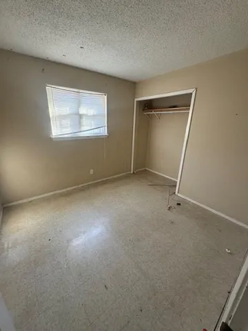 an empty room with a workbench