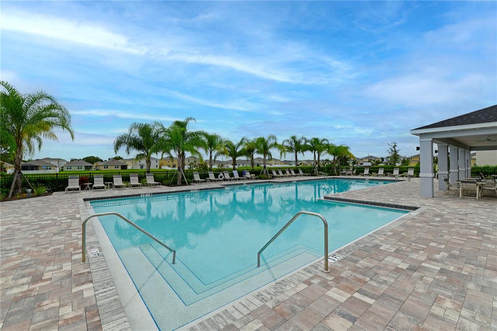 4919 Wedgeleaf Way Palmetto, FL 34221 - Photo 34 of 35 a view of swimming pool with outdoor seating and plants