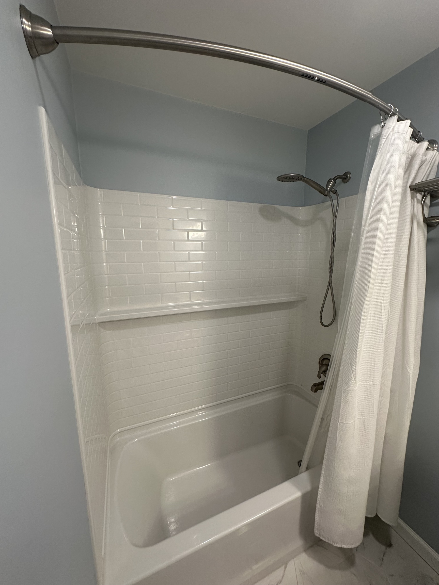 14 Linden Street, Unit C Norwalk, CT 06851 - Photo 13 of 16 a bathroom with a glass shower door