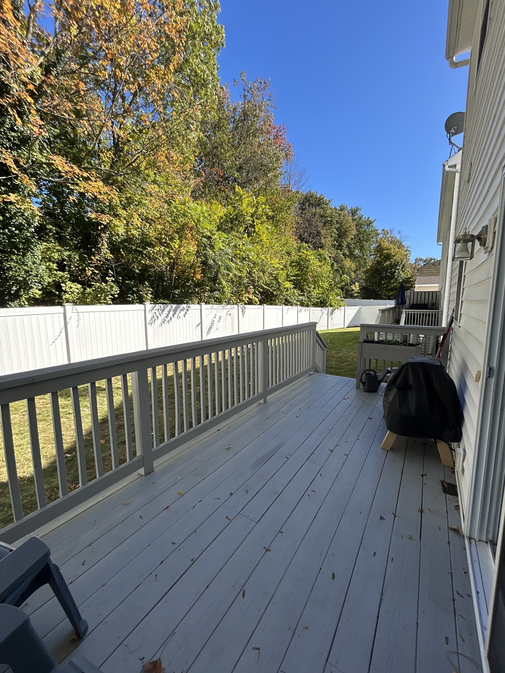 14 Linden Street, Unit C Norwalk, CT 06851 - Photo 15 of 16 a view of a deck with wooden floor and fence