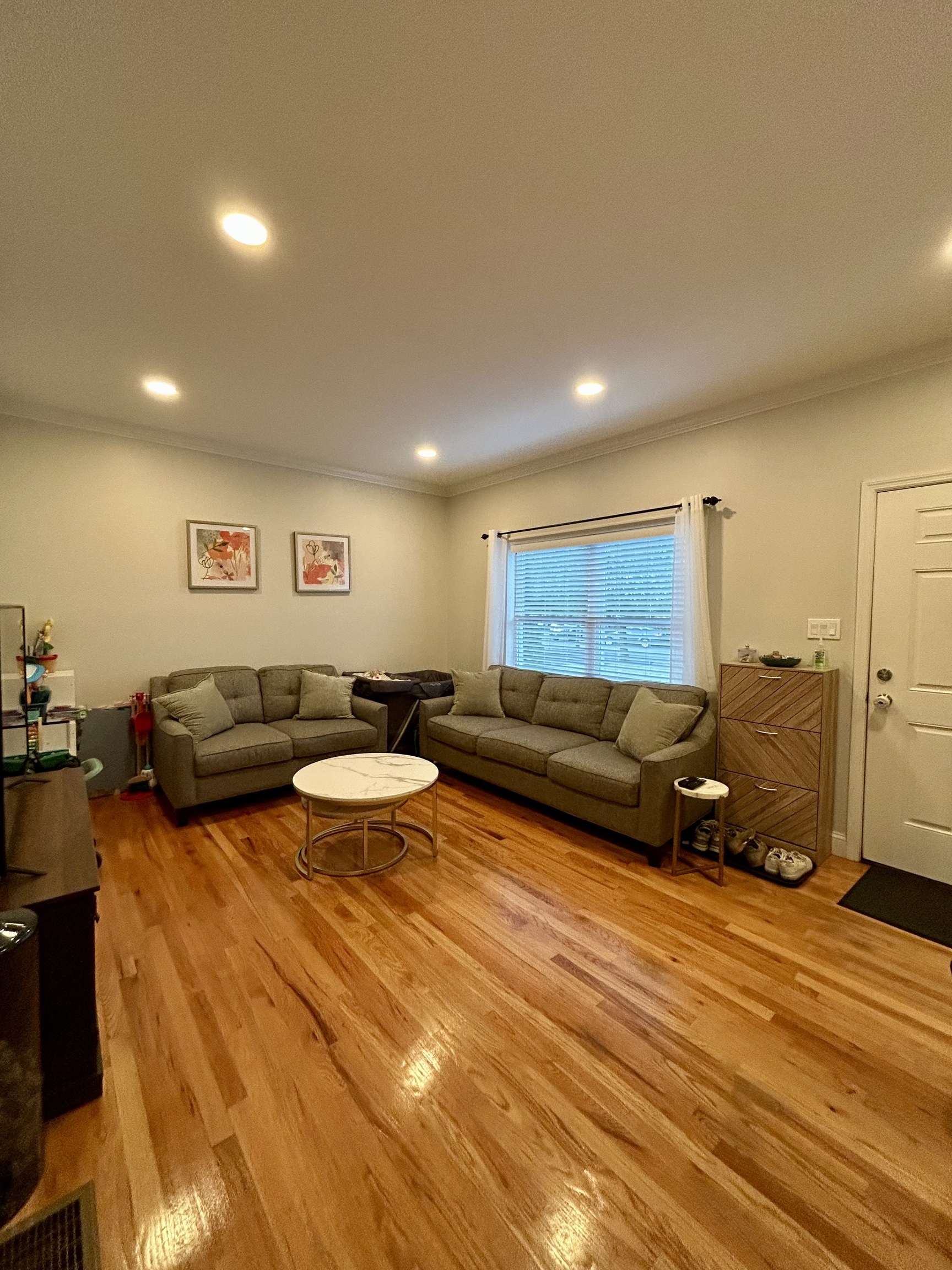 14 Linden Street, Unit C Norwalk, CT 06851 - Photo 2 of 16 a living room with furniture and a wooden floor