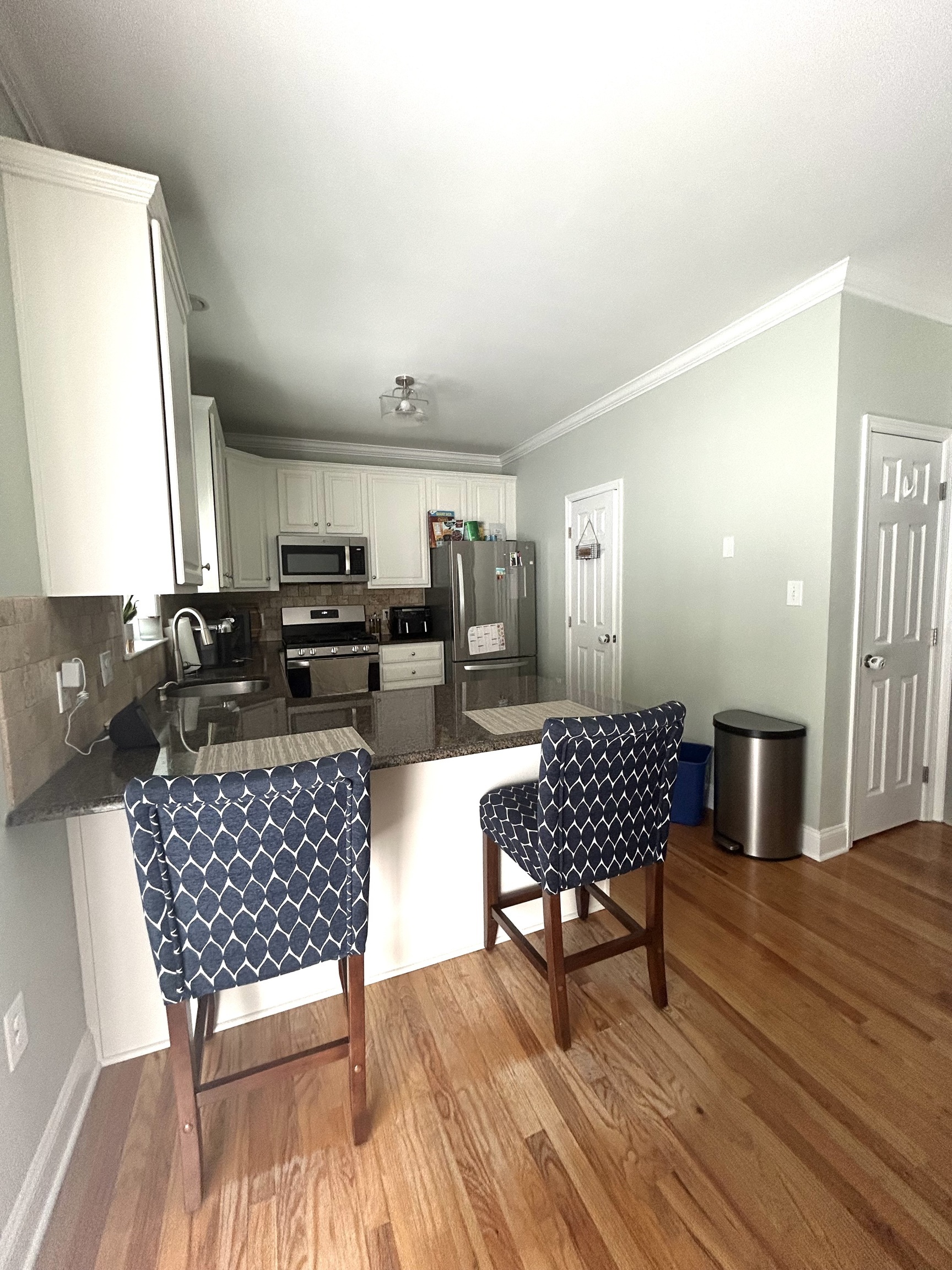 14 Linden Street, Unit C Norwalk, CT 06851 - Photo 5 of 16 a living room with furniture and wooden floor