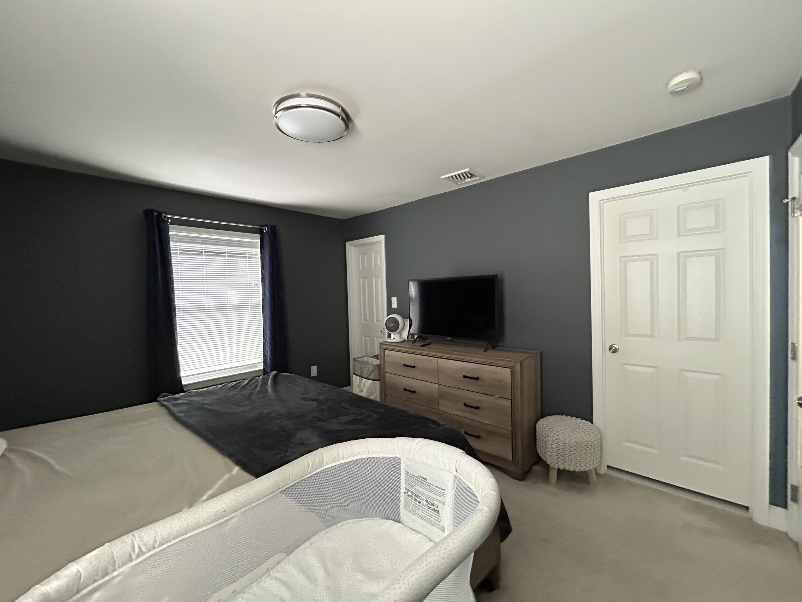 14 Linden Street, Unit C Norwalk, CT 06851 - Photo 9 of 16 a living room with furniture and a flat screen tv