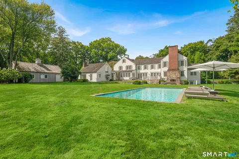 a view of a house with a big yard