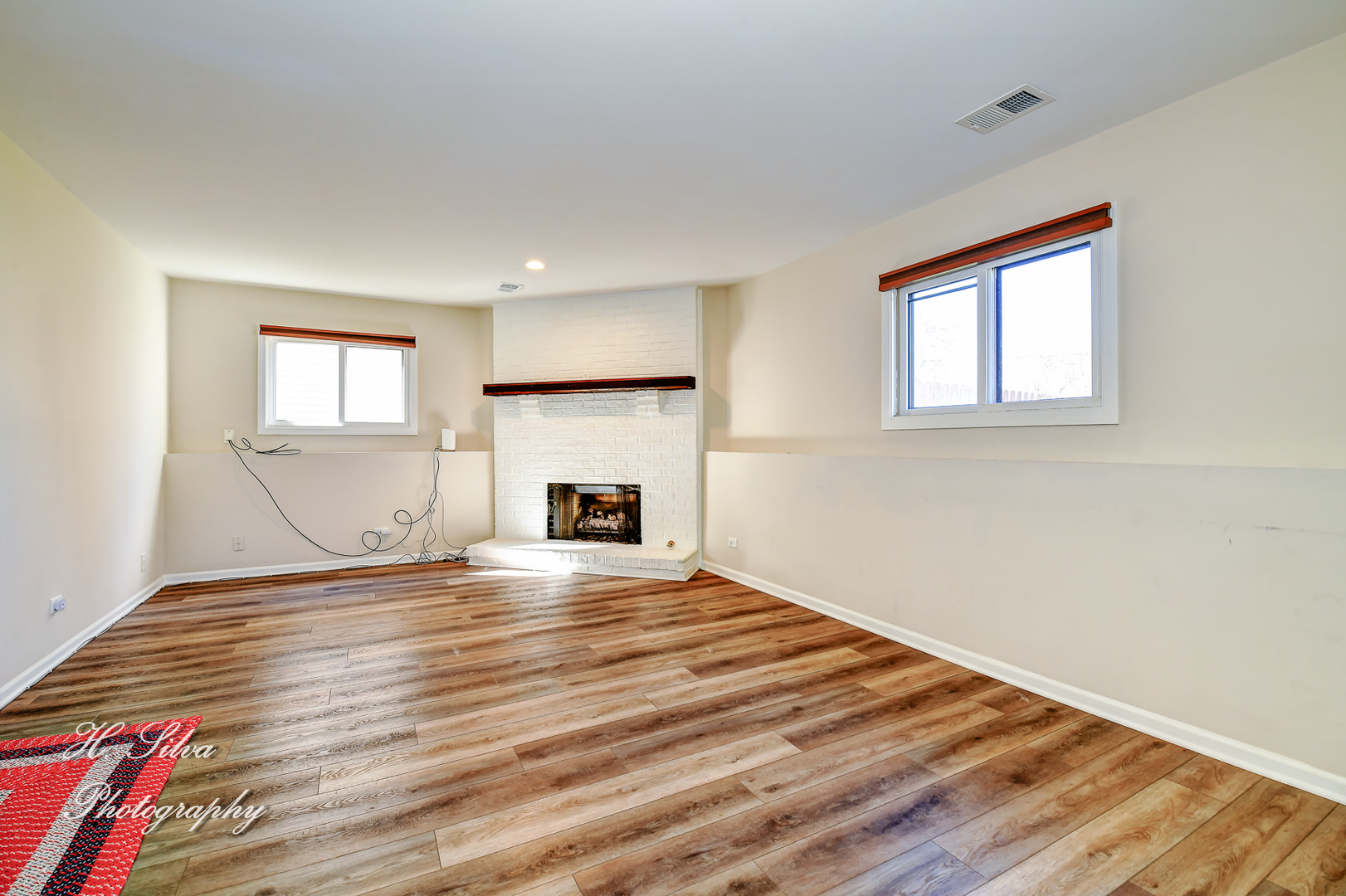 109 Deerpath Road Lake In The Hills, IL 60156 - Photo 10 of 22 a view of empty room with wooden floor and fan