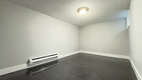 an empty room with a workbench