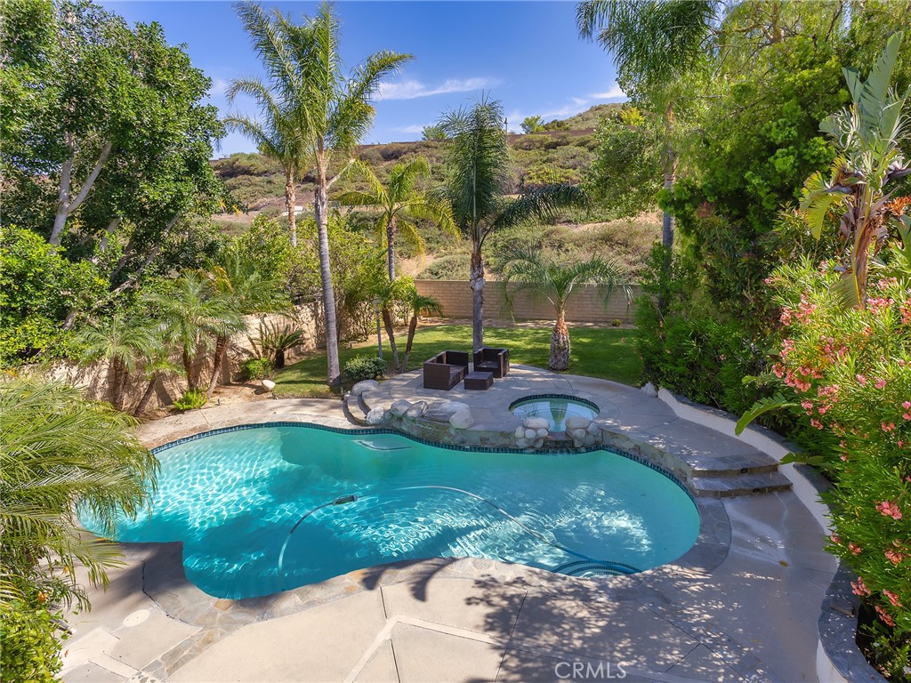 20316 Wynfreed Lane Porter Ranch, CA 91326 - Photo 1 of 51 a view of a backyard with a garden