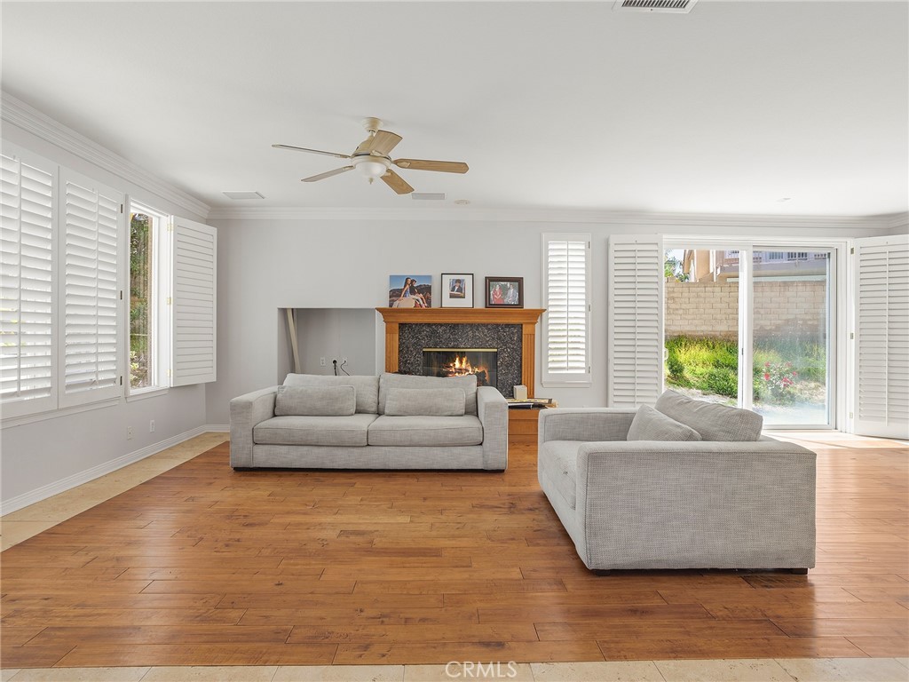 20316 Wynfreed Lane Porter Ranch, CA 91326 - Photo 19 of 51 a living room with furniture and a large window