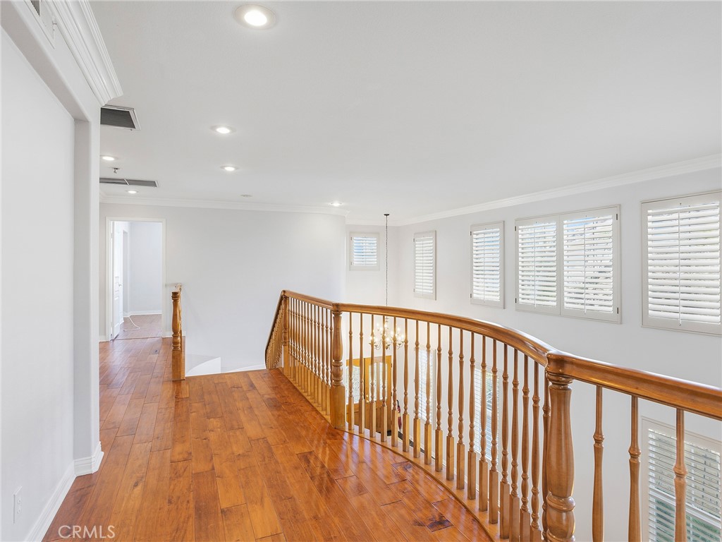 20316 Wynfreed Lane Porter Ranch, CA 91326 - Photo 34 of 51 a view of hallway with wooden floor