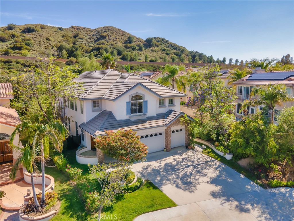 20316 Wynfreed Lane Porter Ranch, CA 91326 - Photo 43 of 51 a aerial view of a house with a yard and a large tree