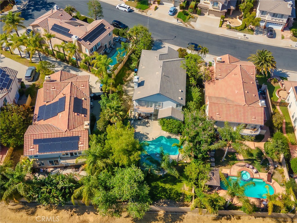 20316 Wynfreed Lane Porter Ranch, CA 91326 - Photo 46 of 51 an aerial view of a house with a yard and garden