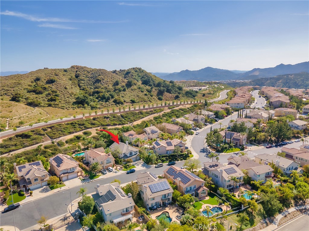 20316 Wynfreed Lane Porter Ranch, CA 91326 - Photo 49 of 51 an aerial view of residential house and sandy dunes
