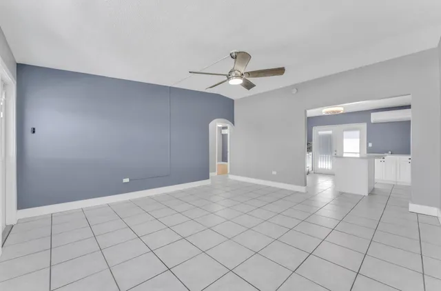 a view of an empty room and window