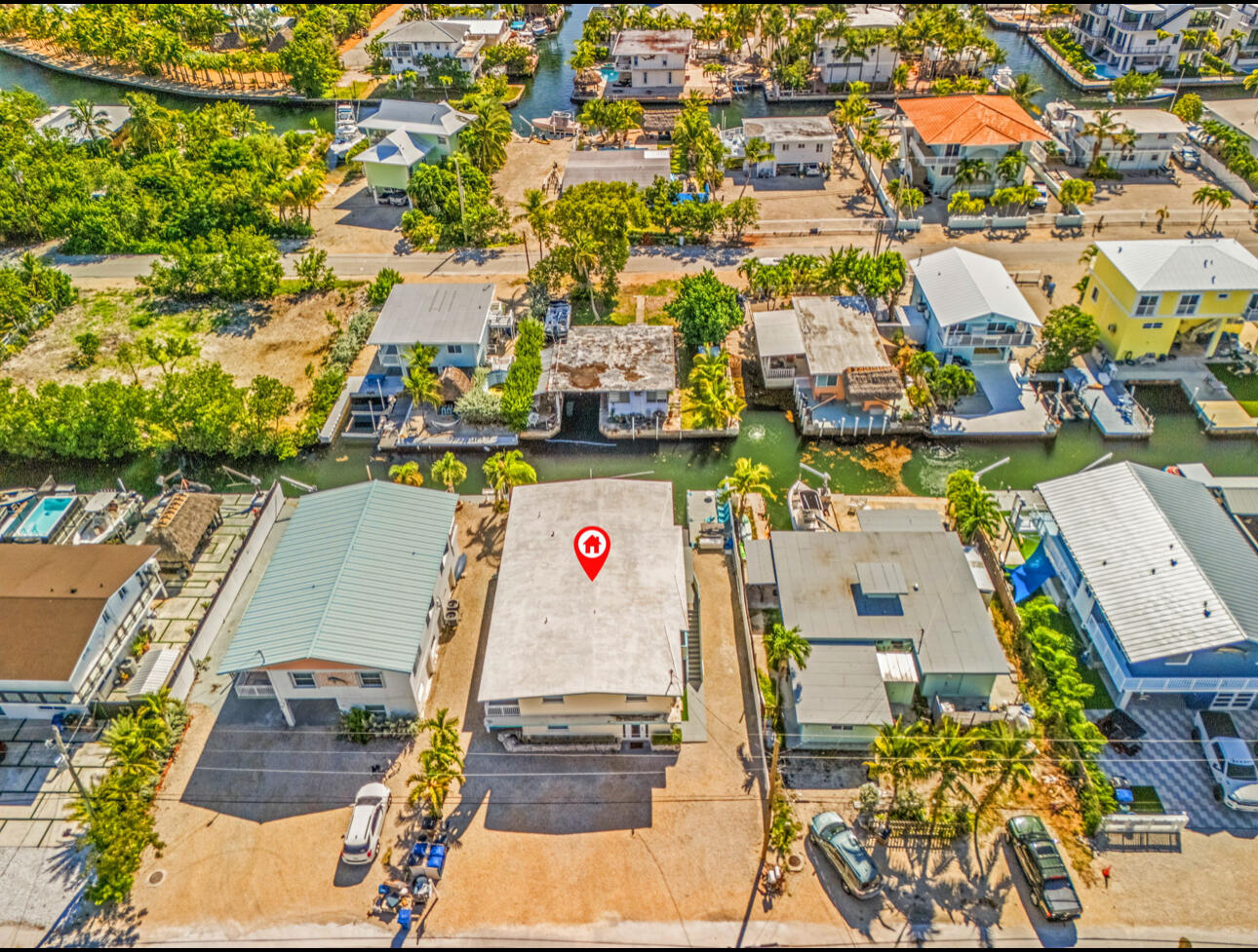 67 Coral Drive, Unit 1 Key Largo, FL 33037 - Photo 2 of 23 an aerial view of residential houses with outdoor space