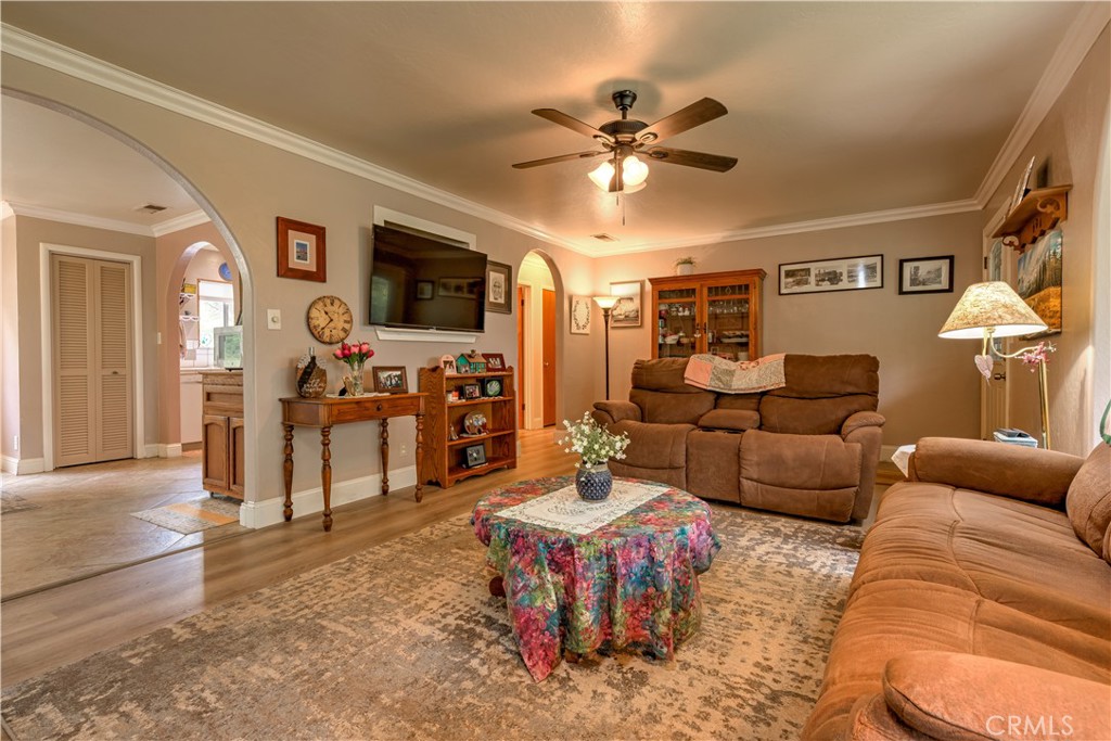 1044 Mt Ida Road Oroville, CA 95966 - Photo 19 of 44 a living room with furniture and a flat screen tv