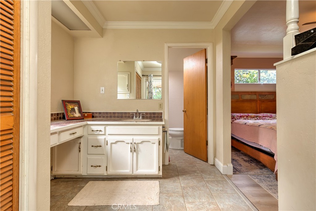 1044 Mt Ida Road Oroville, CA 95966 - Photo 29 of 44 a bathroom with a sink and a mirror