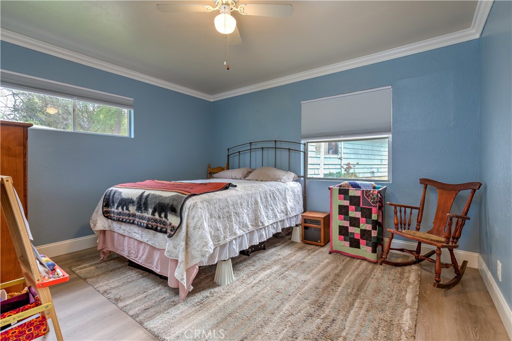 1044 Mt Ida Road Oroville, CA 95966 - Photo 31 of 44 a bedroom with bed and a window
