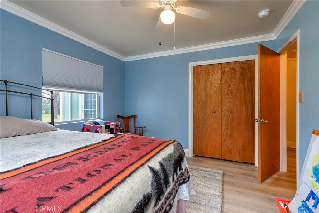 1044 Mt Ida Road Oroville, CA 95966 - Photo 32 of 44 a bed sitting in a bedroom next to a window
