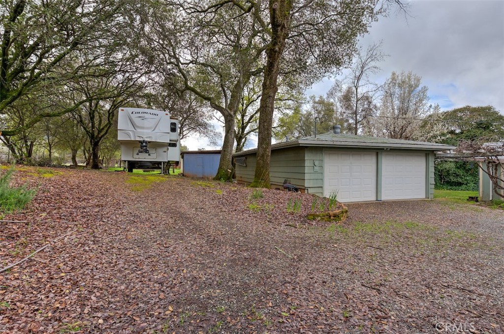 1044 Mt Ida Road Oroville, CA 95966 - Photo 43 of 44 a view of a house with a yard and garage