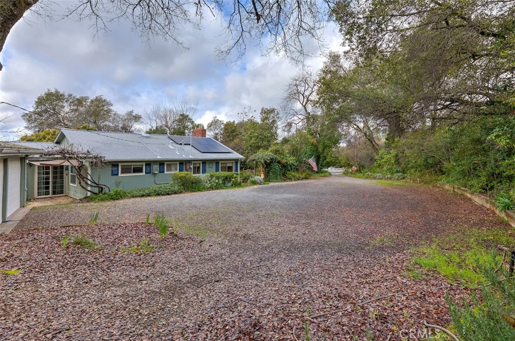 1044 Mt Ida Road Oroville, CA 95966 - Photo 44 of 44 a view of a big house with a big yard plants and large trees