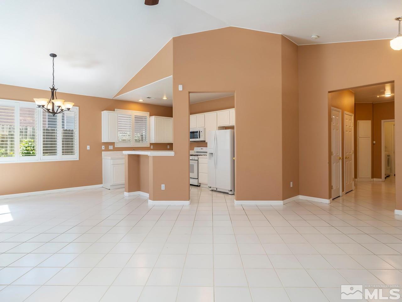 10402 Gold Trail Drive Reno, NV 89521 - Photo 5 of 16 a view of a kitchen with a kitchen and a window