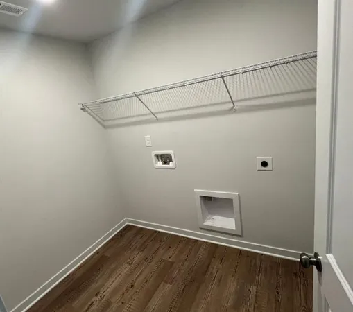 a view of a room with racks on the wall