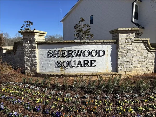 a outdoor space with a sign broad