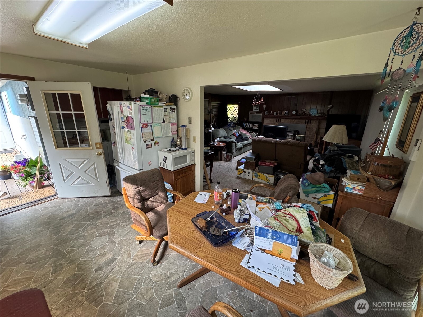 30 Restful Road Grapeview, WA 98546 - Photo 12 of 18 a living room with furniture and a flat screen tv