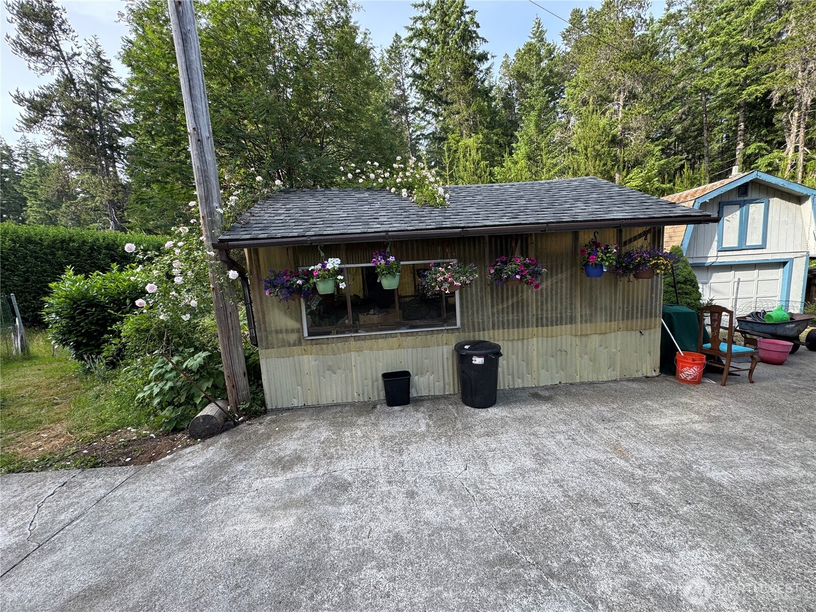 30 Restful Road Grapeview, WA 98546 - Photo 5 of 18 a view of a car park in front of house