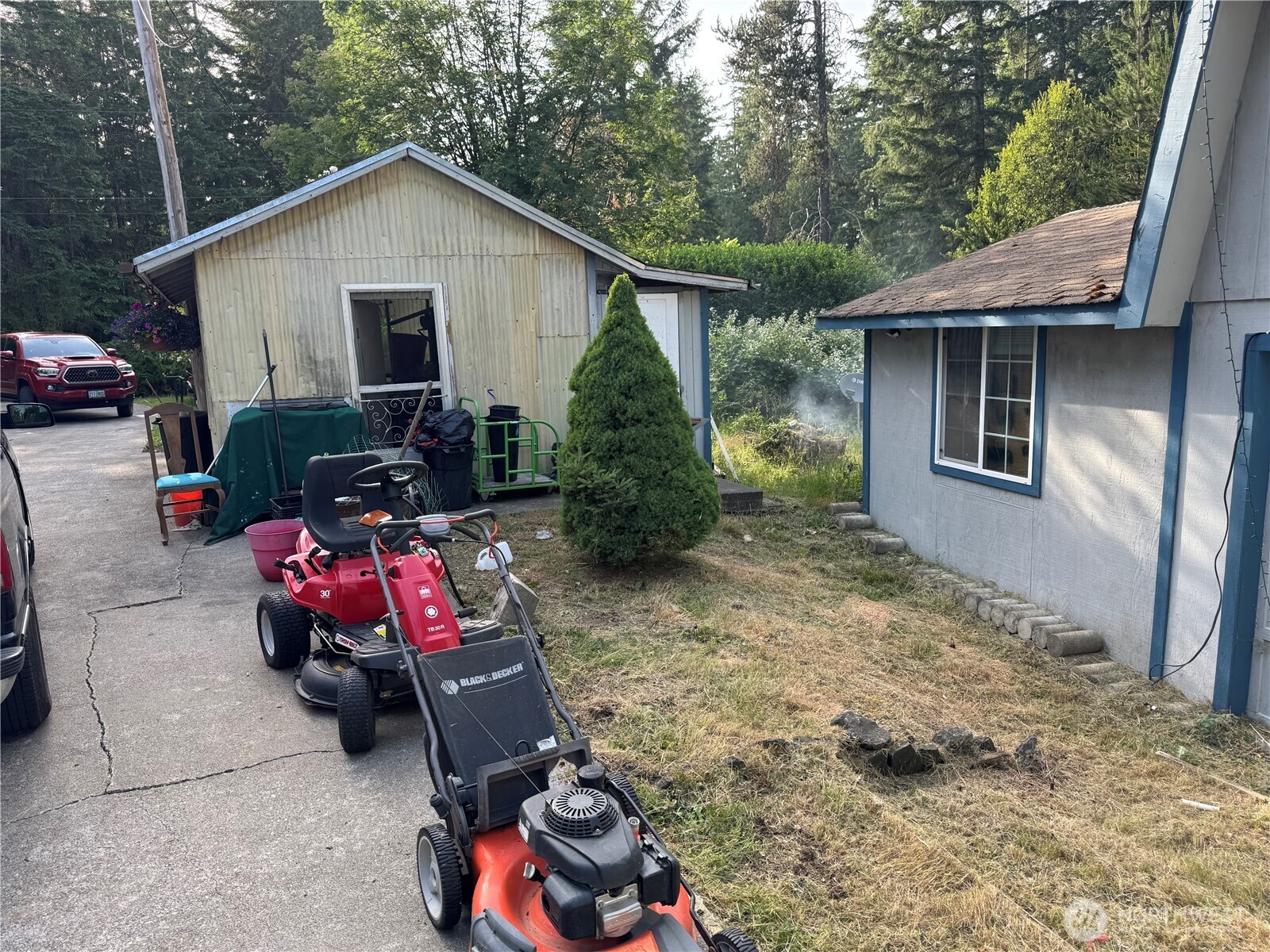 30 Restful Road Grapeview, WA 98546 - Photo 6 of 18 a view of backyard of the house