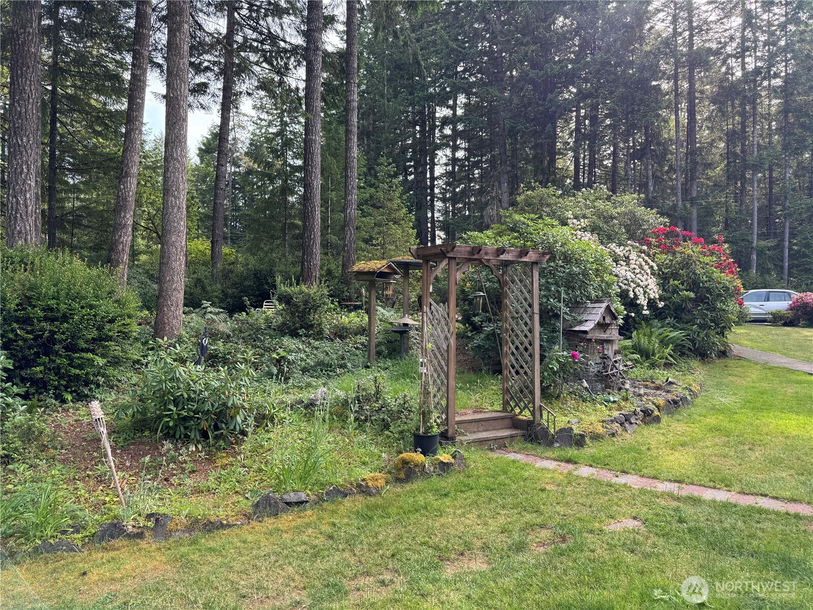 30 Restful Road Grapeview, WA 98546 - Photo 8 of 18 a view of a park that has large trees