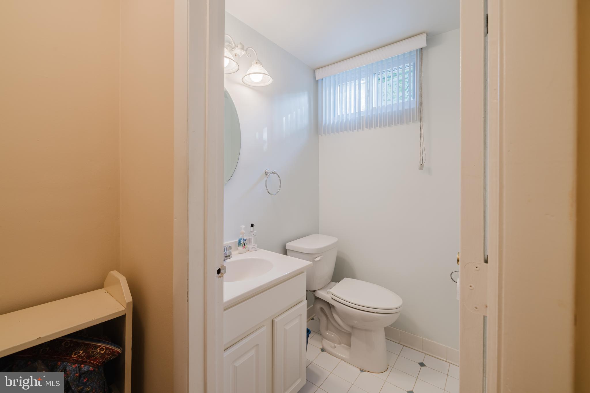 8300 Thornton Road Baltimore, MD 21204 - Photo 21 of 41 Convenient basement powder room