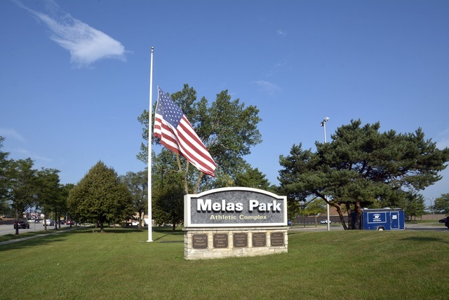 1322 West Central Road Mount Prospect, IL 60056 - Photo 23 of 28 a sign on the side of the tree