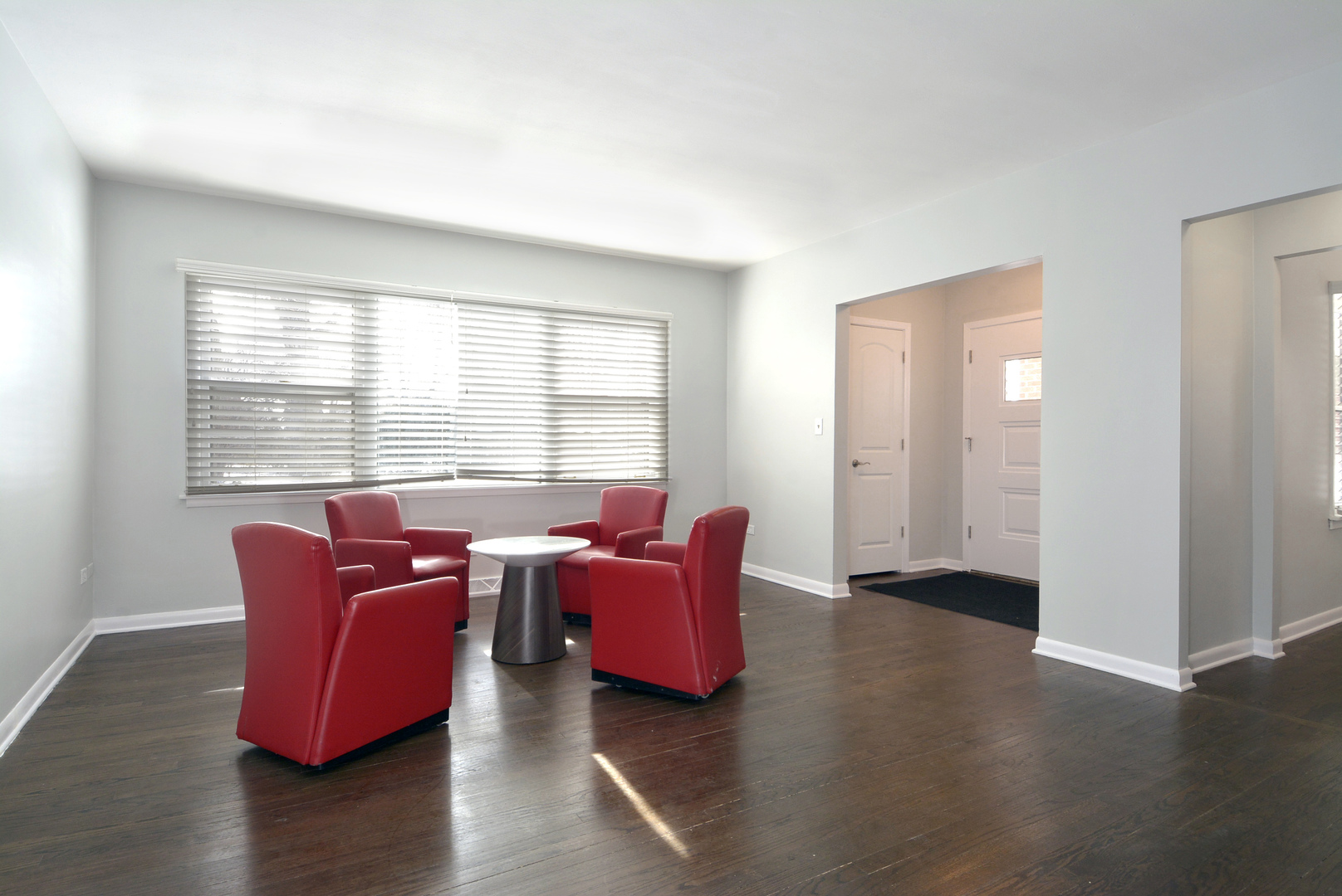 1322 West Central Road Mount Prospect, IL 60056 - Photo 3 of 28 a living room with furniture and wooden floor