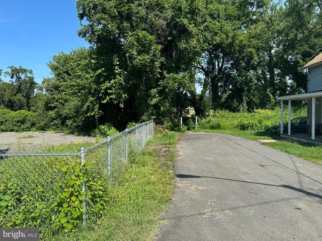 a room with a bed furniture and a window