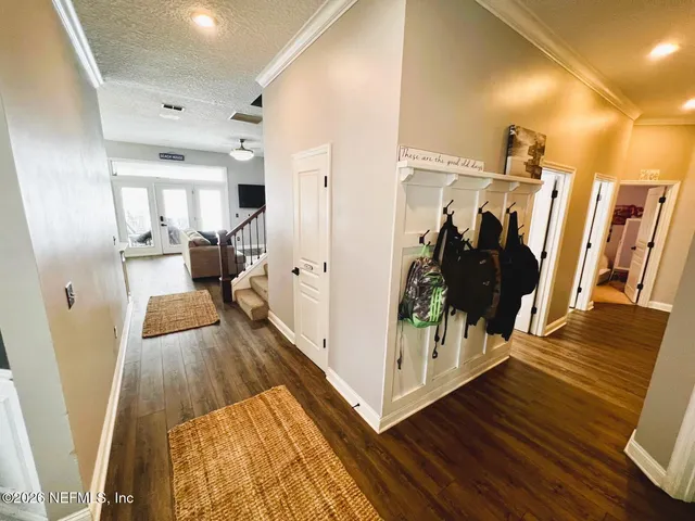 a view of a living room with a large window