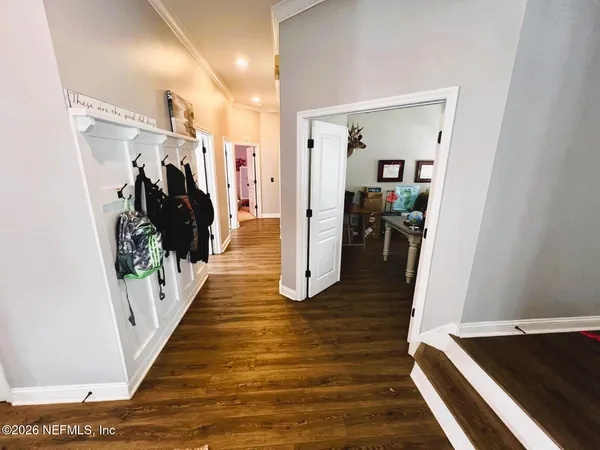 a hallway view with living room