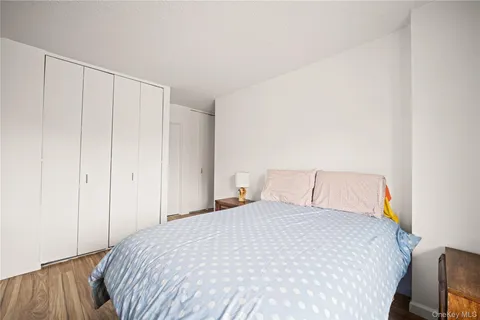 a large white bed in a white room