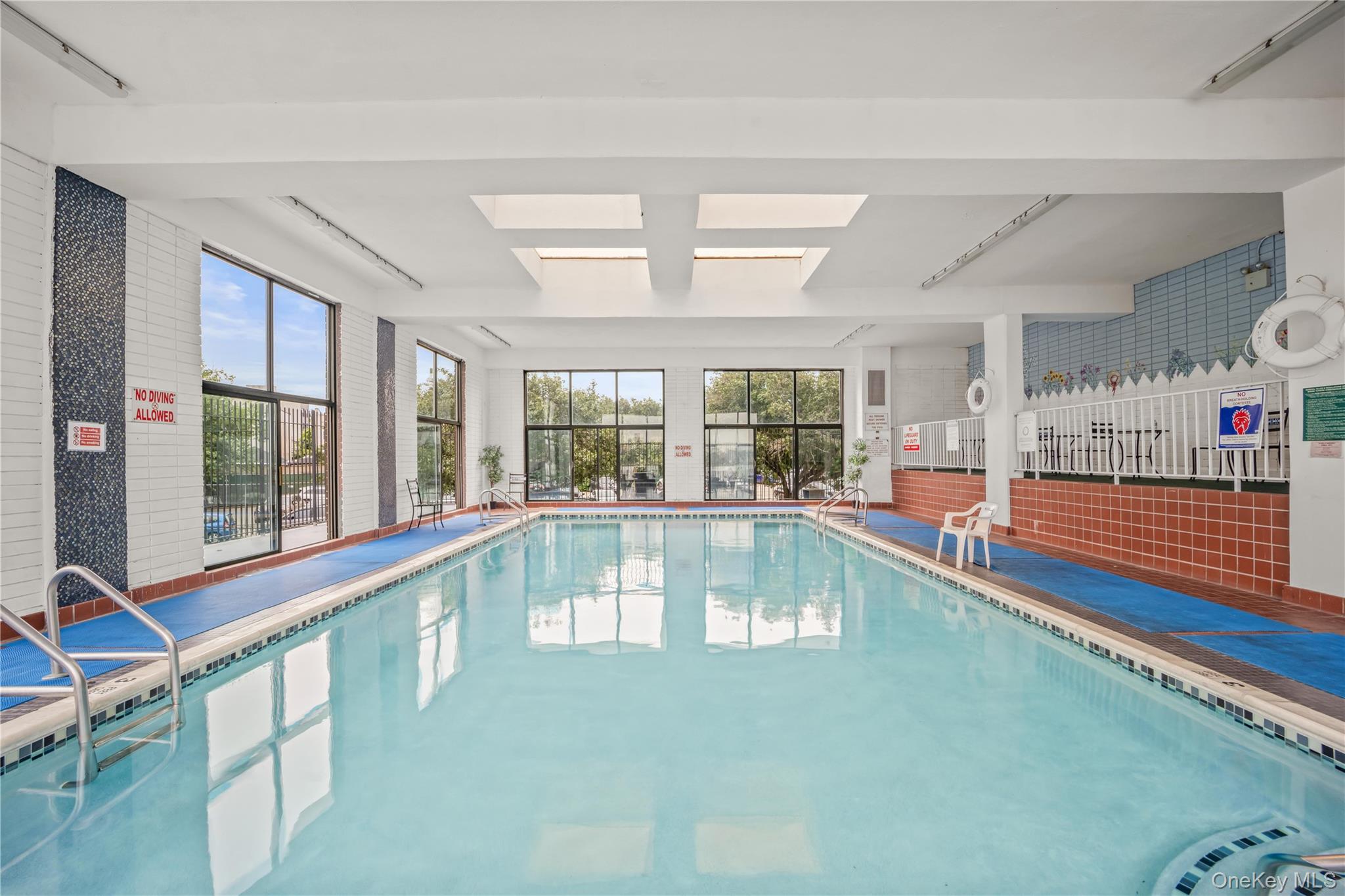 25-40 Shore Boulevard, Unit 2E Queens, NY 11102 - Photo 19 of 21 a view of a swimming pool and window
