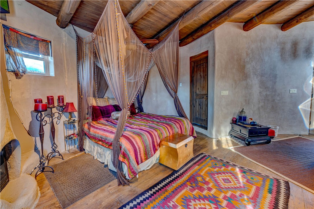 17445 South La Cienega Ranch Road Yucca, AZ 86438 - Photo 26 of 52 a bed room with a bed and a baby crib