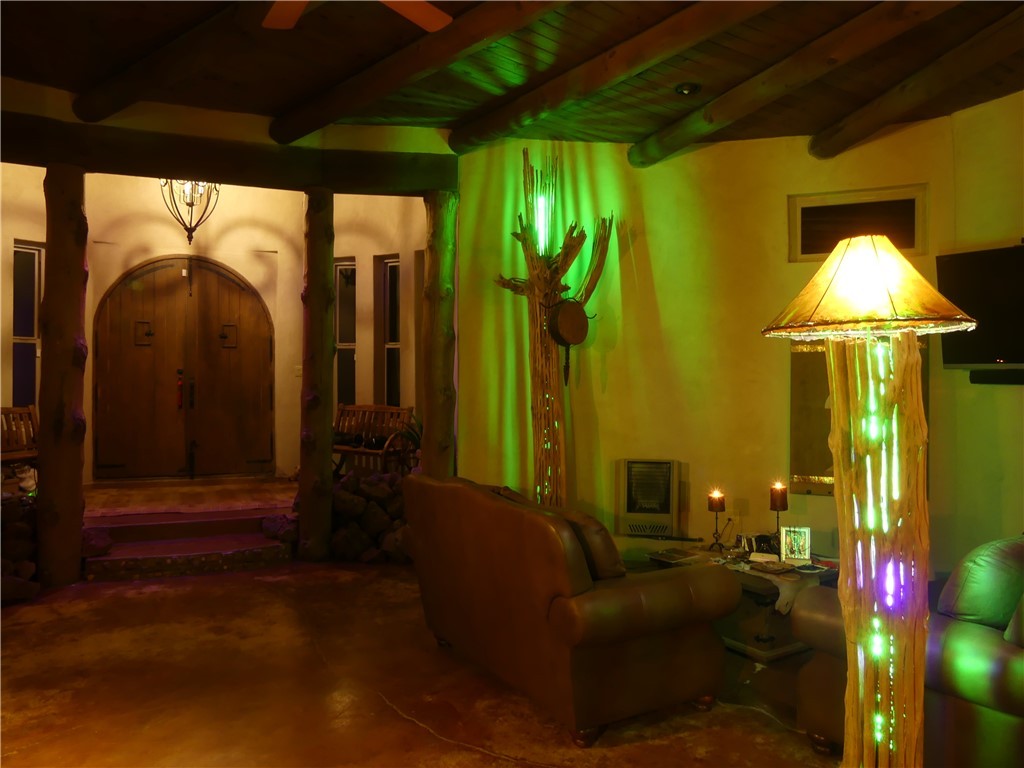 17445 South La Cienega Ranch Road Yucca, AZ 86438 - Photo 47 of 52 a living room with furniture and a chandelier