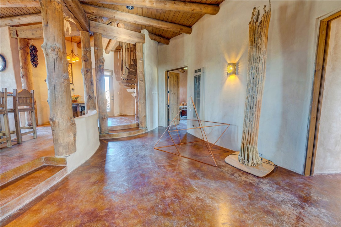 17445 South La Cienega Ranch Road Yucca, AZ 86438 - Photo 7 of 52 a view of a hallway with wooden floor and glass door