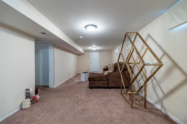 a bathroom with a sink toilet a mirror and shower