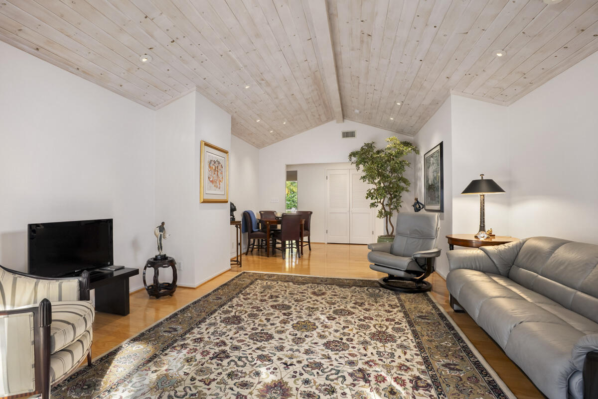 1859 Barker Pass Road Santa Barbara, CA 93108 - Photo 13 of 26 a living room with furniture and a flat screen tv