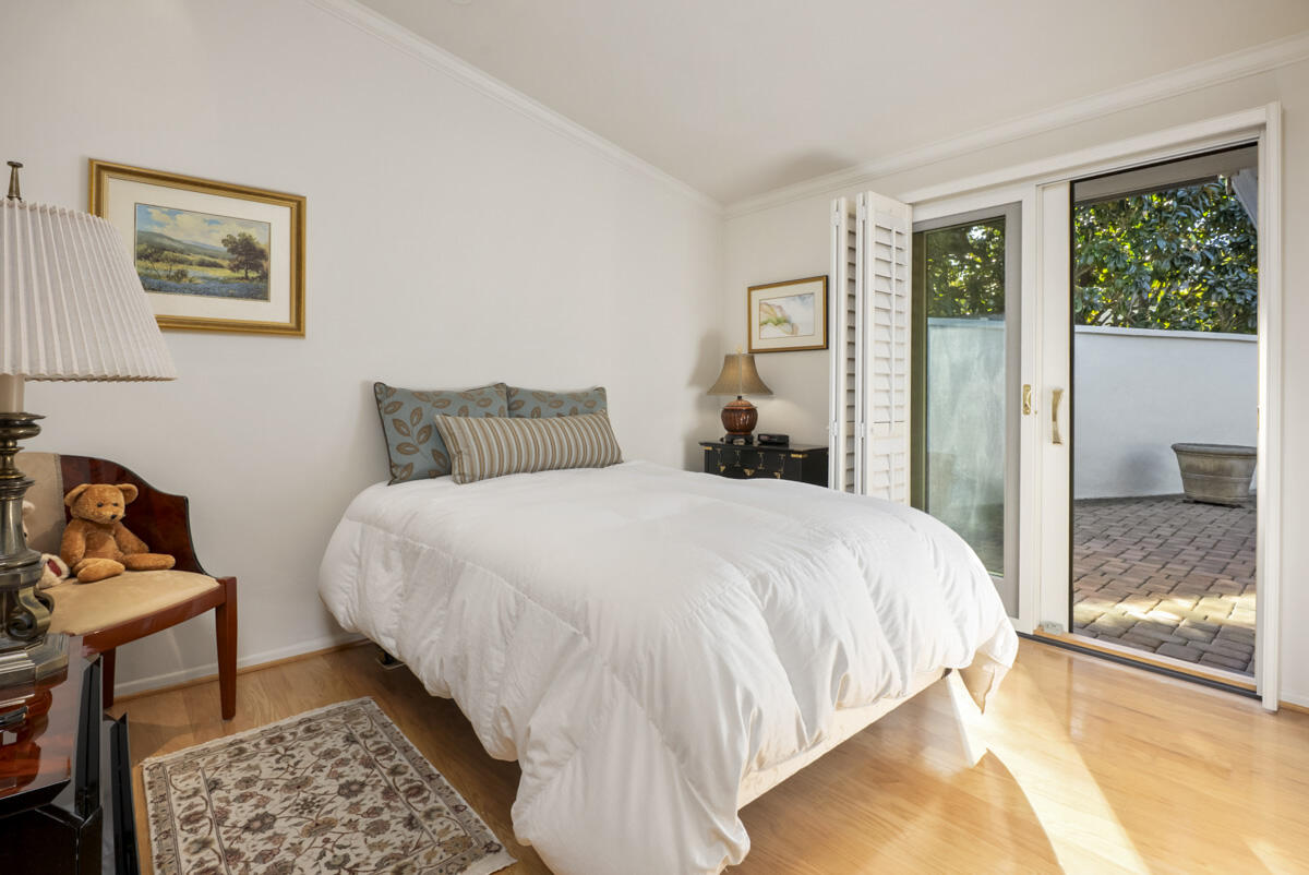 1859 Barker Pass Road Santa Barbara, CA 93108 - Photo 18 of 26 a bedroom with a bed and a window