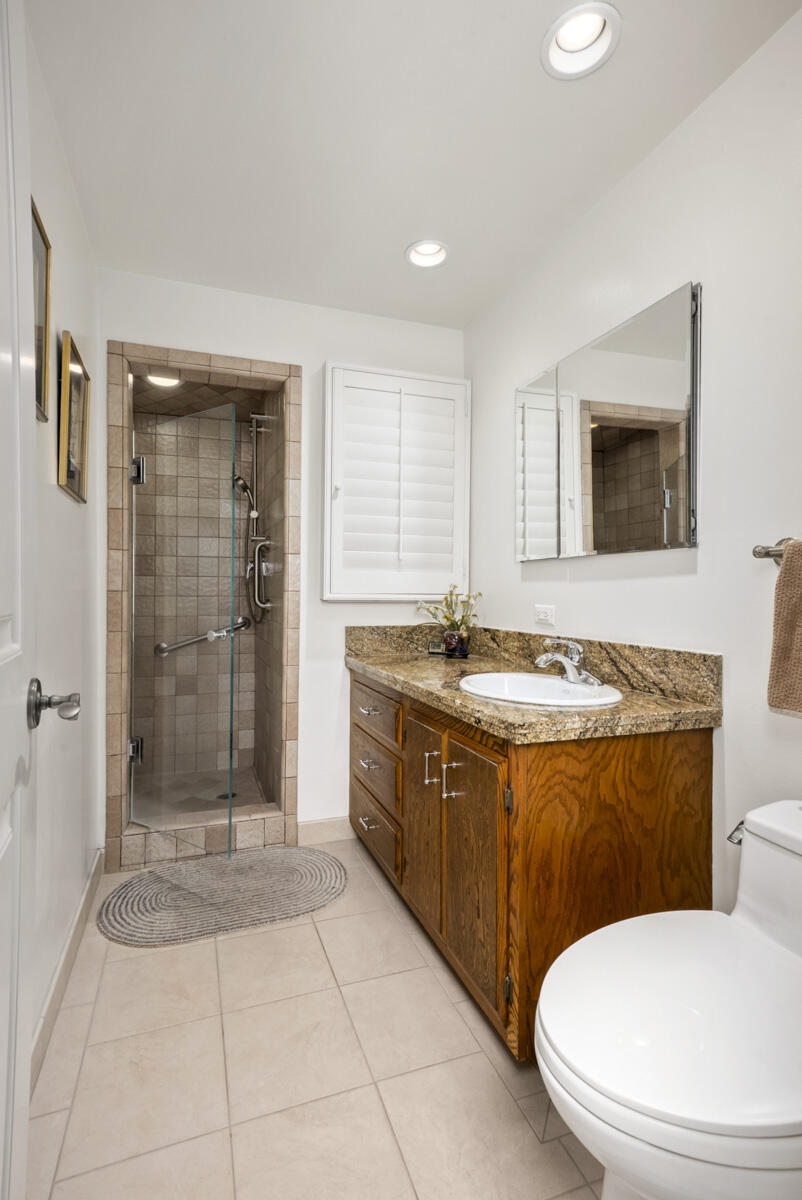 1859 Barker Pass Road Santa Barbara, CA 93108 - Photo 19 of 26 a bathroom with a sink a toilet and shower