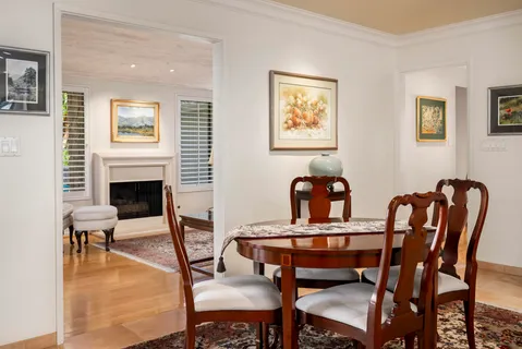 a view of a livingroom with furniture and a fireplace
