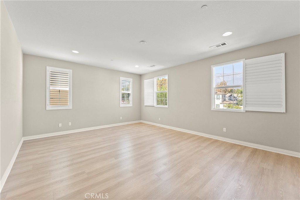 9719 La Vine Court Rancho Cucamonga, CA 91701 - Photo 19 of 39 a view of an empty room with a window